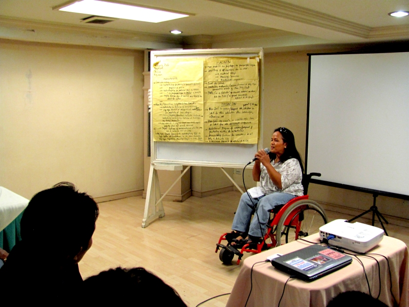 A PWD leader in Cagayan de Oro City shares her insights in Plan International's Area-level Synthesis and Analysis as part of the Project-End Participatory Review during its TS Washi Emergency Response. Photo by me (Enan).